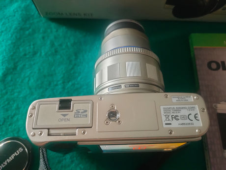 Olympus  Pen EP-12fd306b8-336a-4918-bf00-55052cbefef3